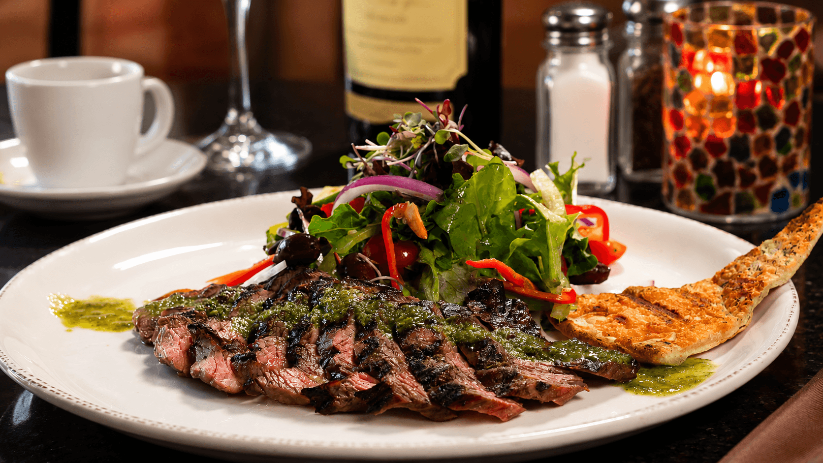 Chimichurri steak salad with mixed greens and cheese crisp